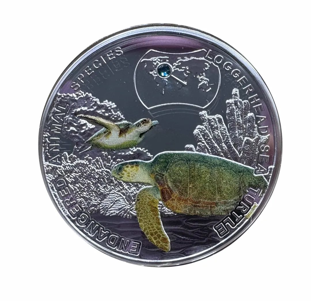Lot 21 — 2014 1 Niue "SOS dla Swiata/SOS to the World" : Loggerhead Sea Turtle coin .999 (17.48g silver) Proof